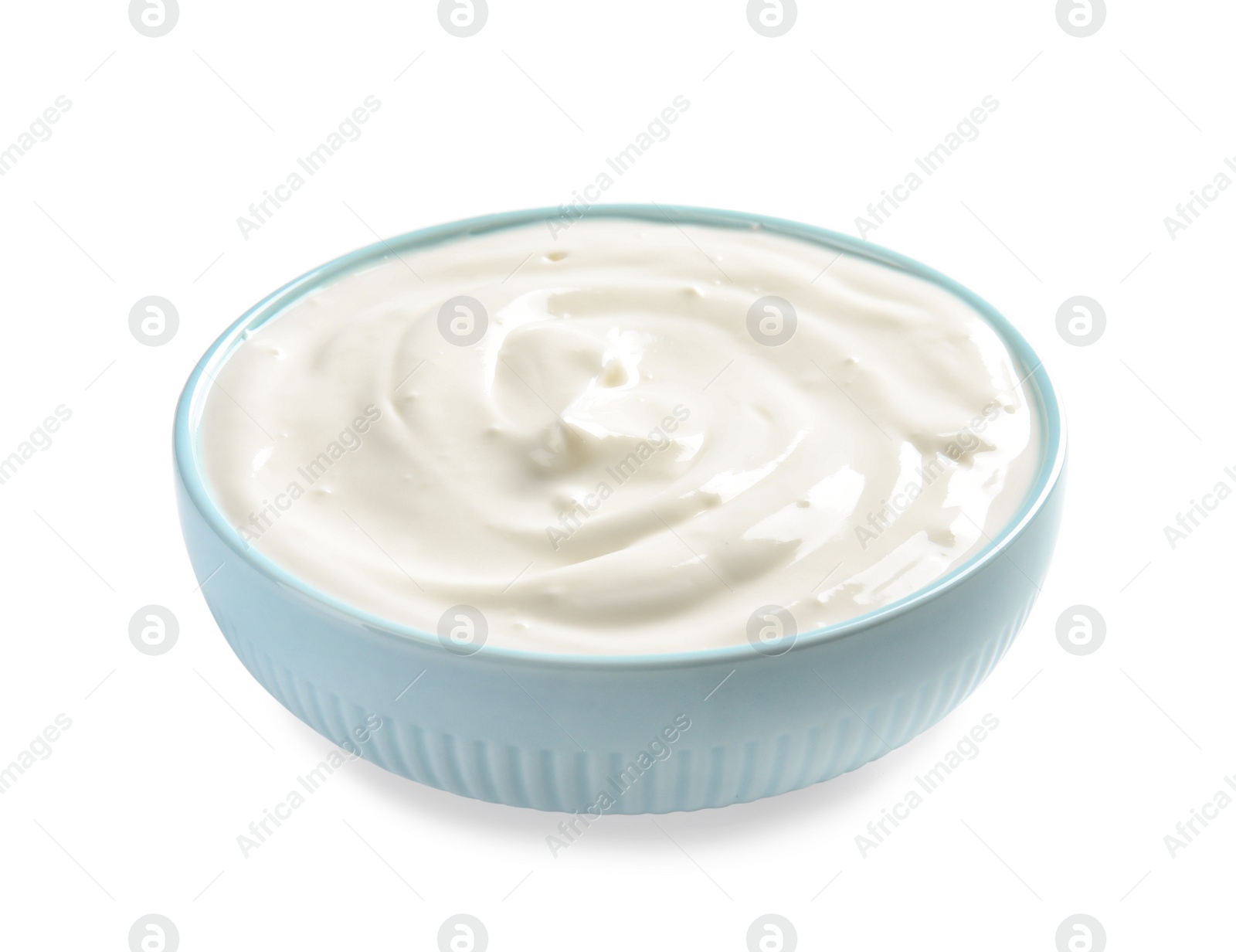 Photo of Bowl with creamy yogurt on white background