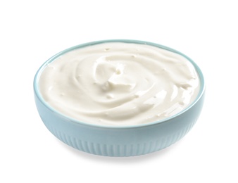 Bowl with creamy yogurt on white background