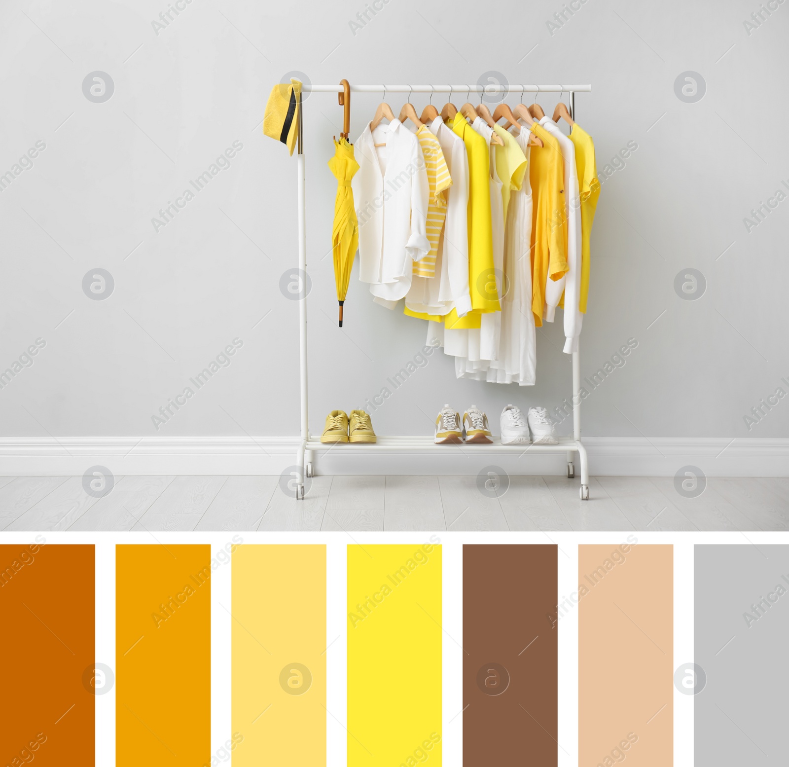 Image of Rack with bright stylish clothes, shoes and accessories near grey wall indoors. Composition inspired by colors of the year 2021