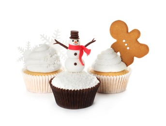 Different beautiful Christmas cupcakes on white background