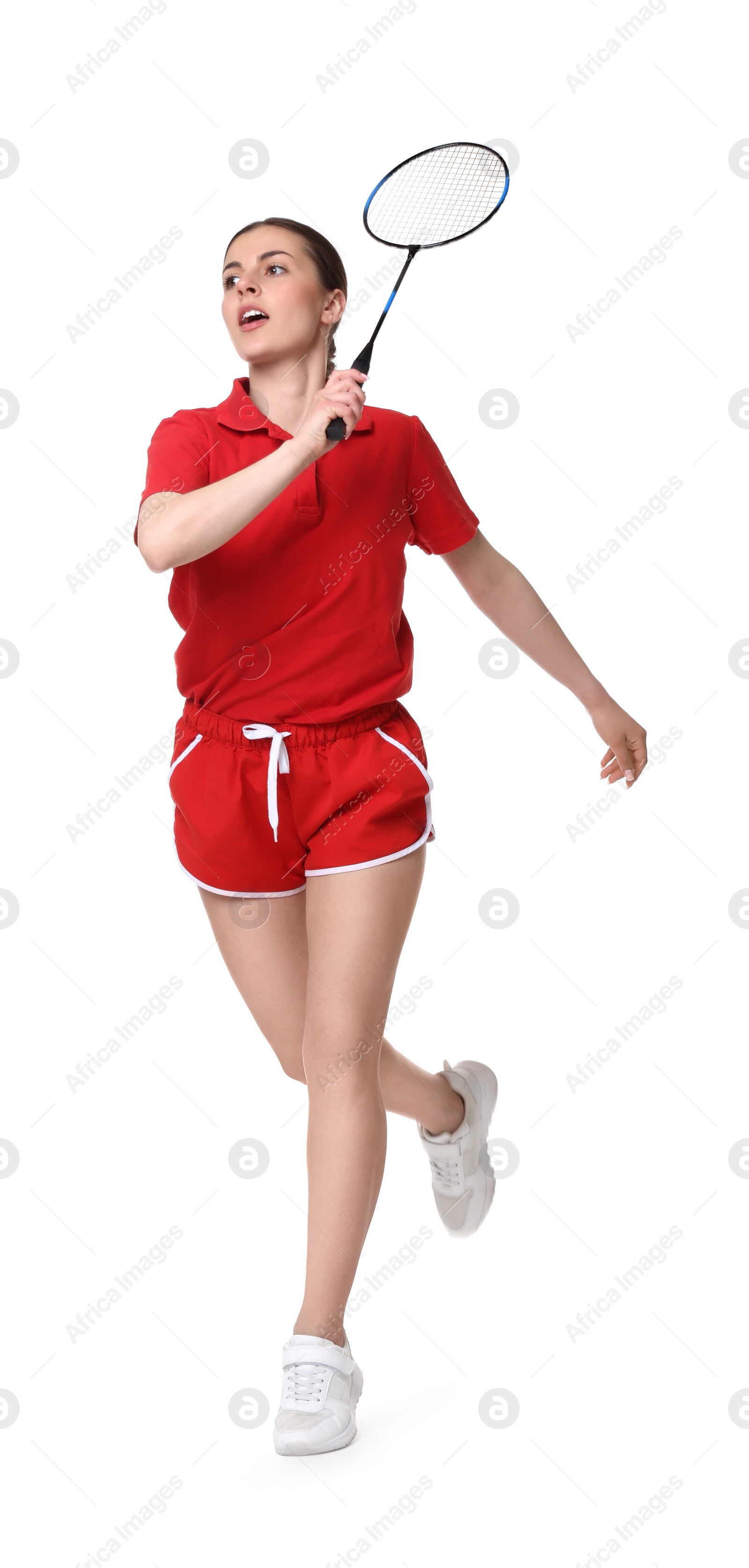 Photo of Young woman playing badminton with racket on white background