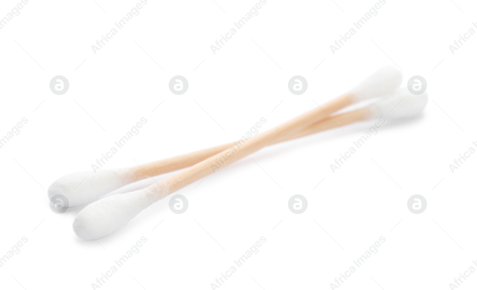 Photo of Wooden cotton swabs on white background. Hygienic accessory