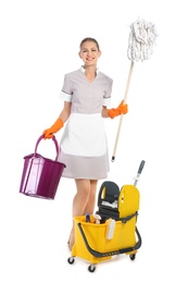 Photo of Young chambermaid with cleaning supplies on white background