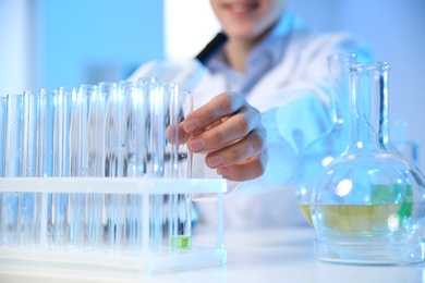 Photo of Male scientist working in chemistry laboratory, closeup