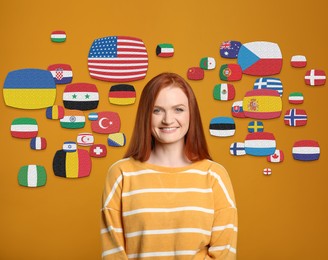 Image of Portrait of interpreter and flags of different countries on yellow background