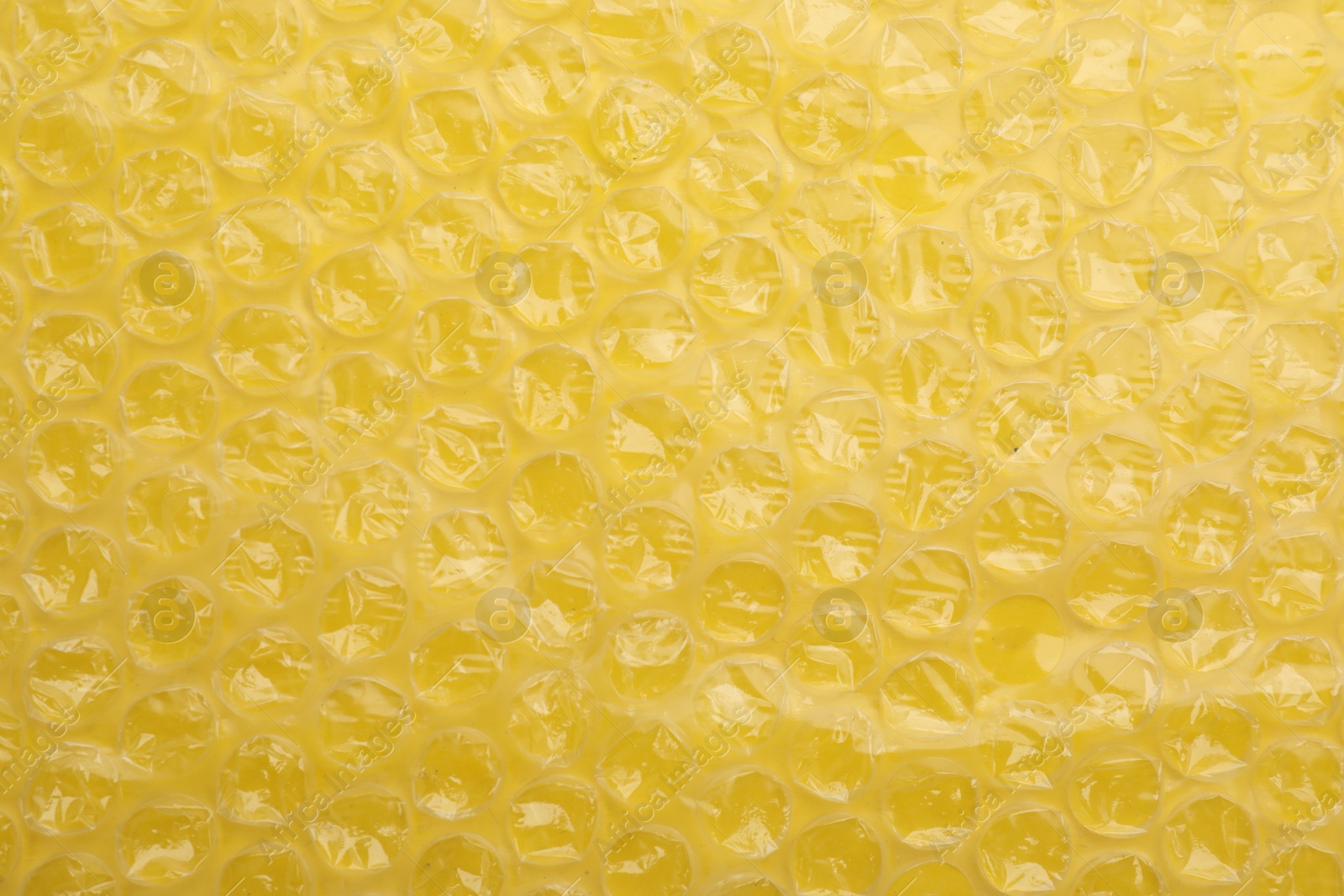 Photo of Texture of bubble wrap as background, top view