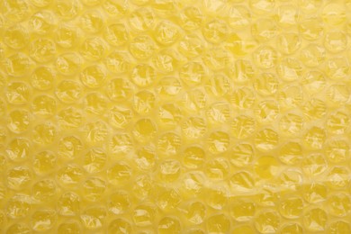 Photo of Texture of bubble wrap as background, top view