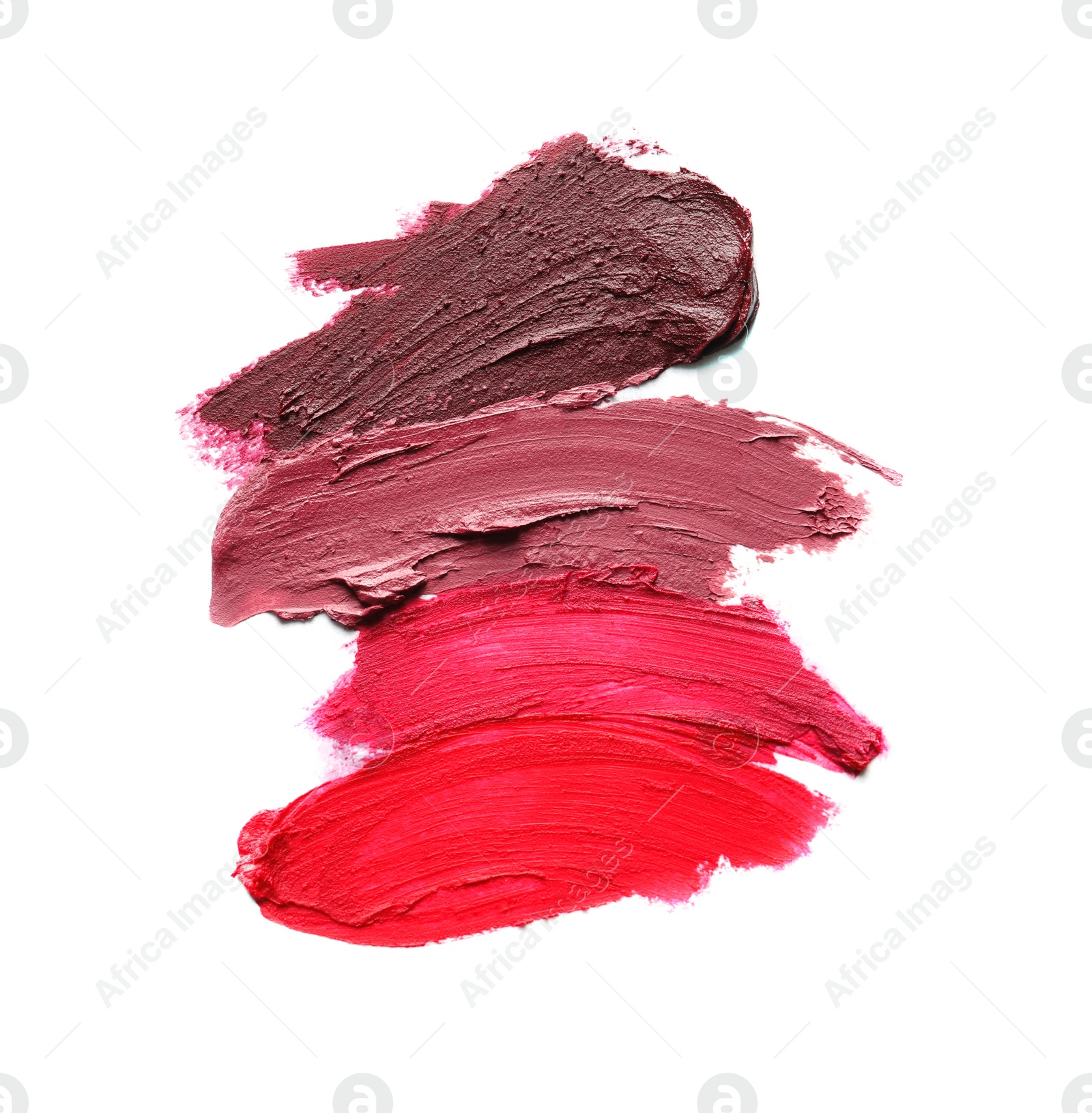 Photo of Lipstick smears isolated on white. Cosmetic product