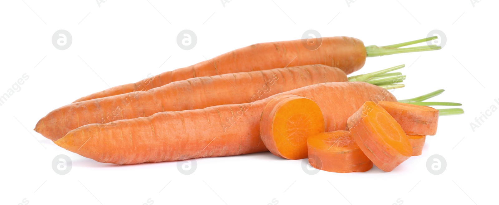 Photo of Tasty ripe organic carrots on white background