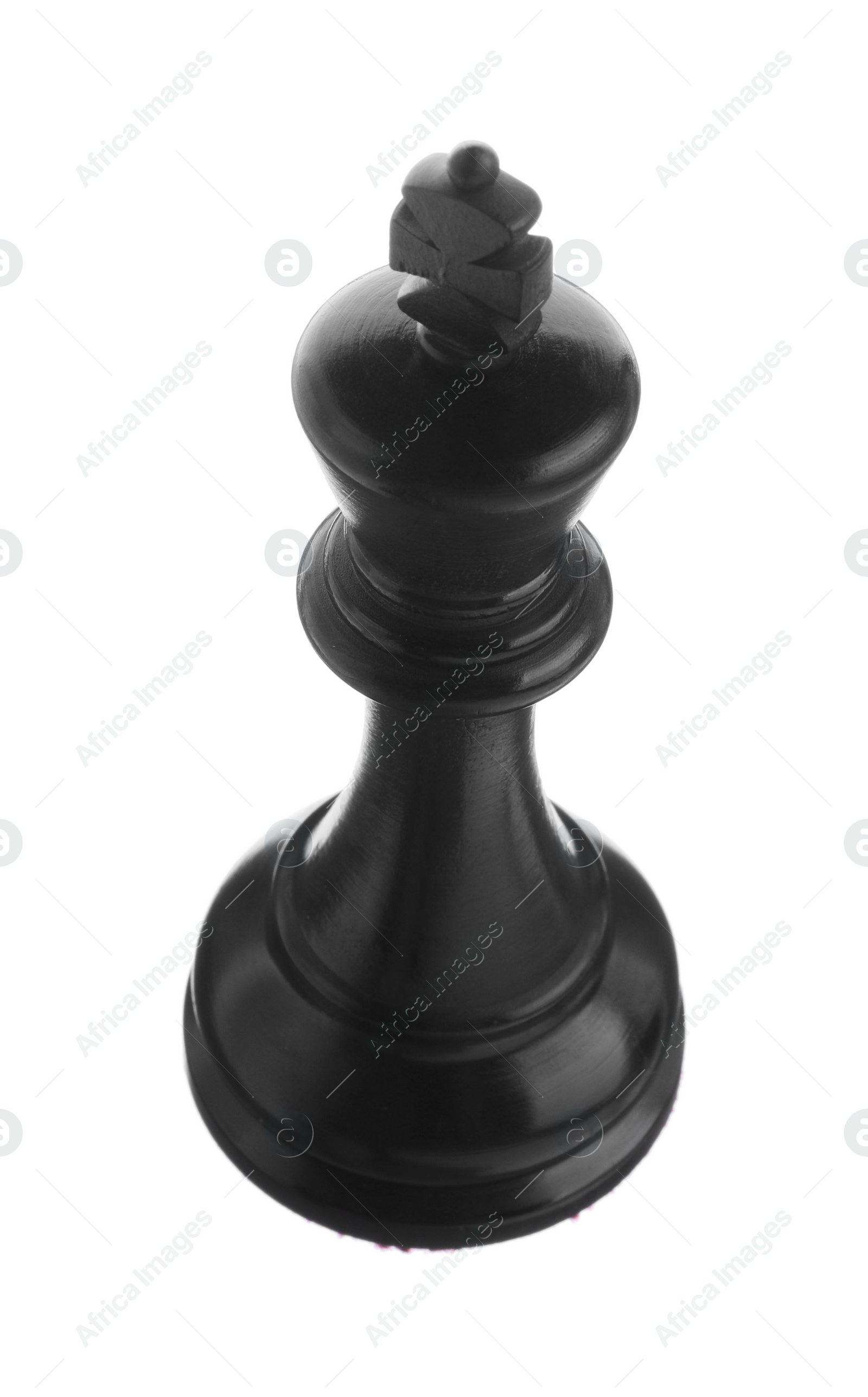 Photo of Black wooden chess king isolated on white