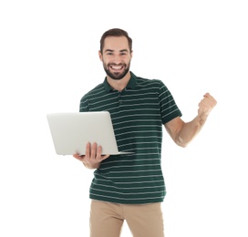 Photo of Emotional young man with laptop celebrating victory on white background