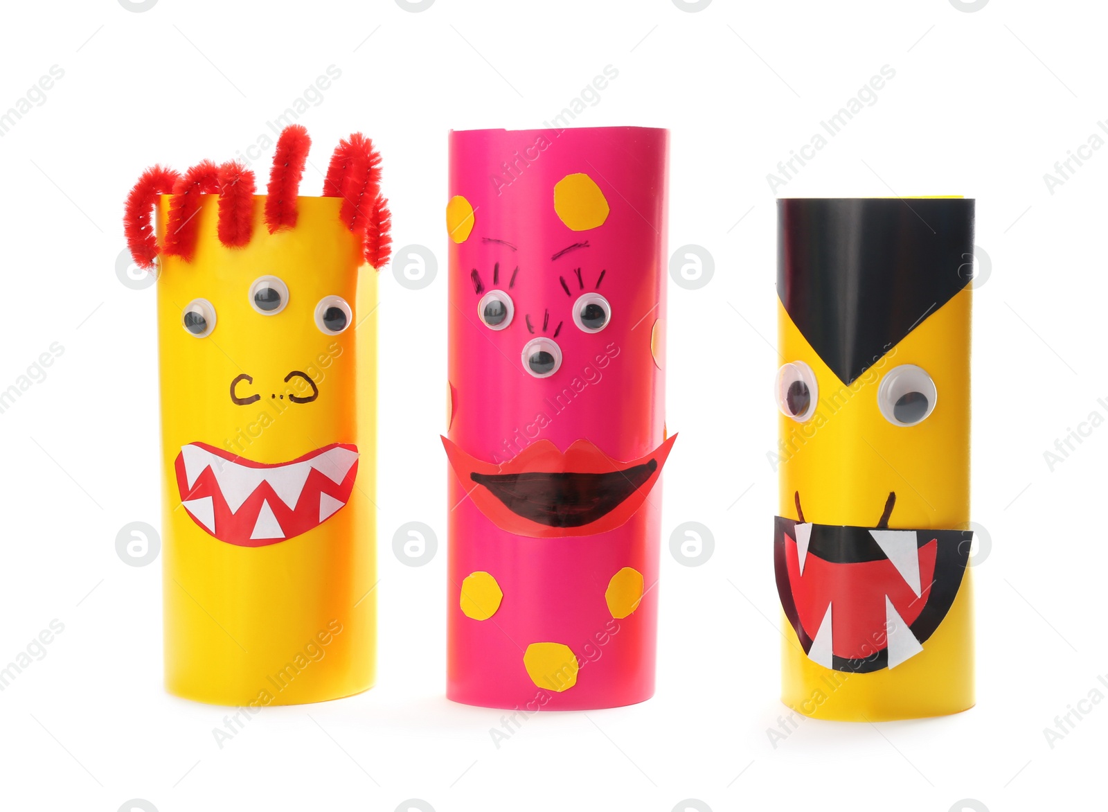 Photo of Funny monsters on white background. Halloween decoration