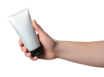 Photo of Man holding tube of facial cream isolated on white, closeup. Mockup for design