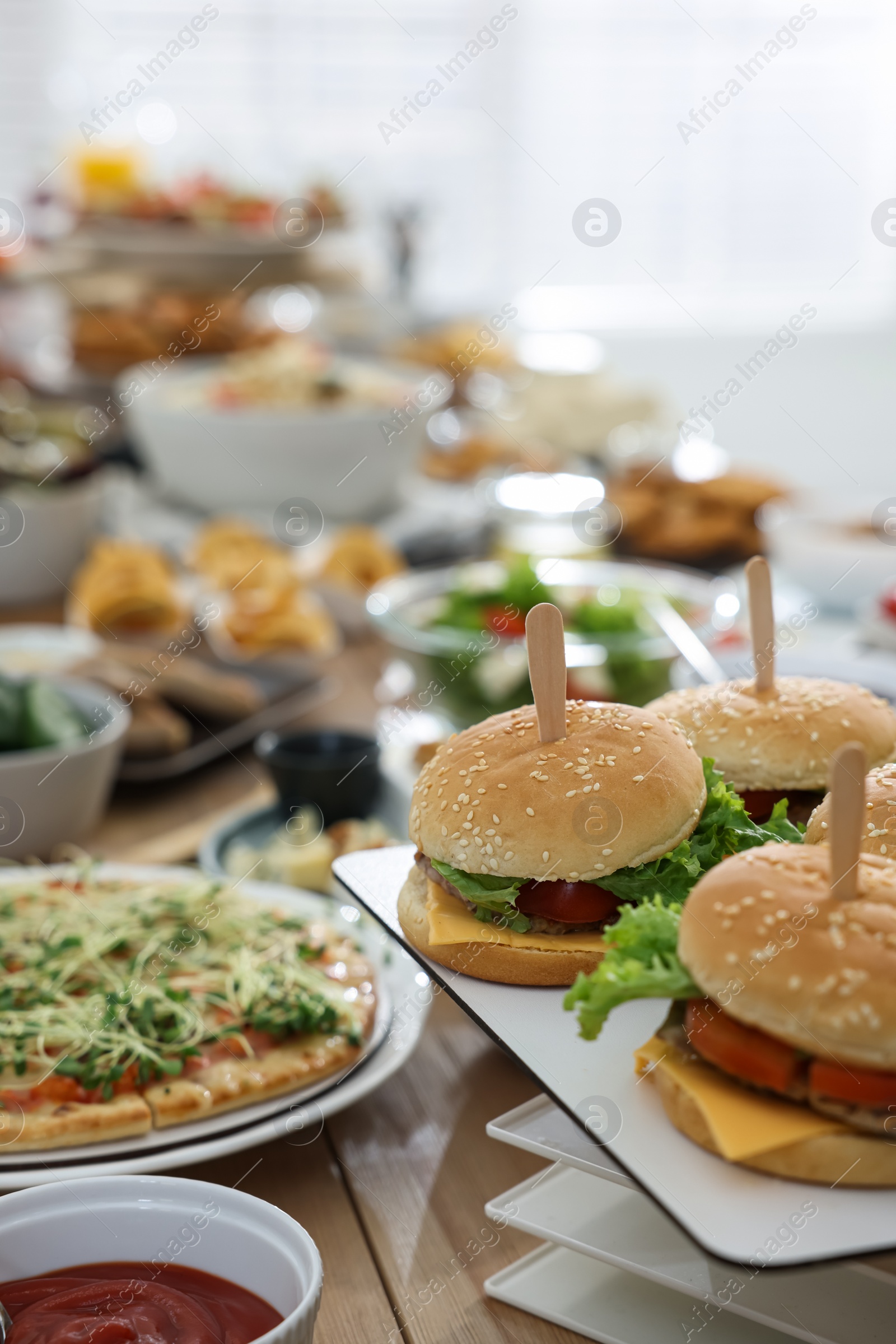 Photo of Brunch table setting with different delicious food indoors