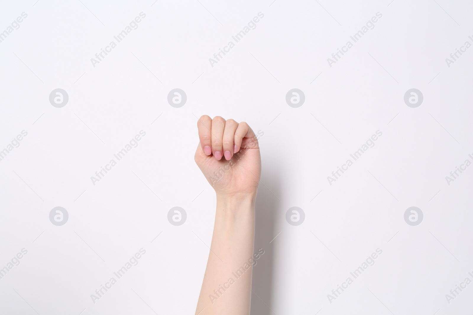 Photo of SOS gesture. Woman showing signal for help on white background, closeup