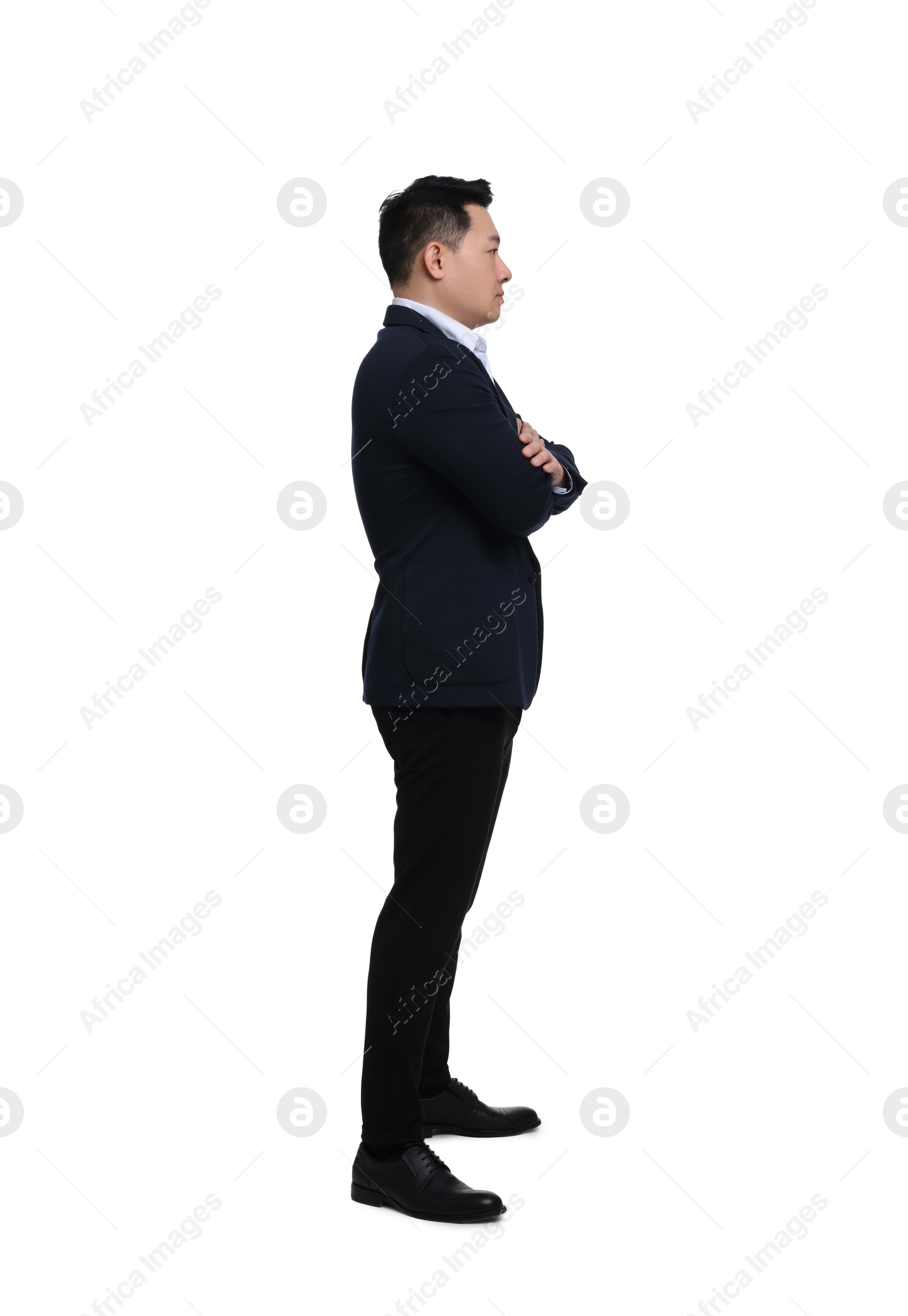 Photo of Businessman in suit posing on white background