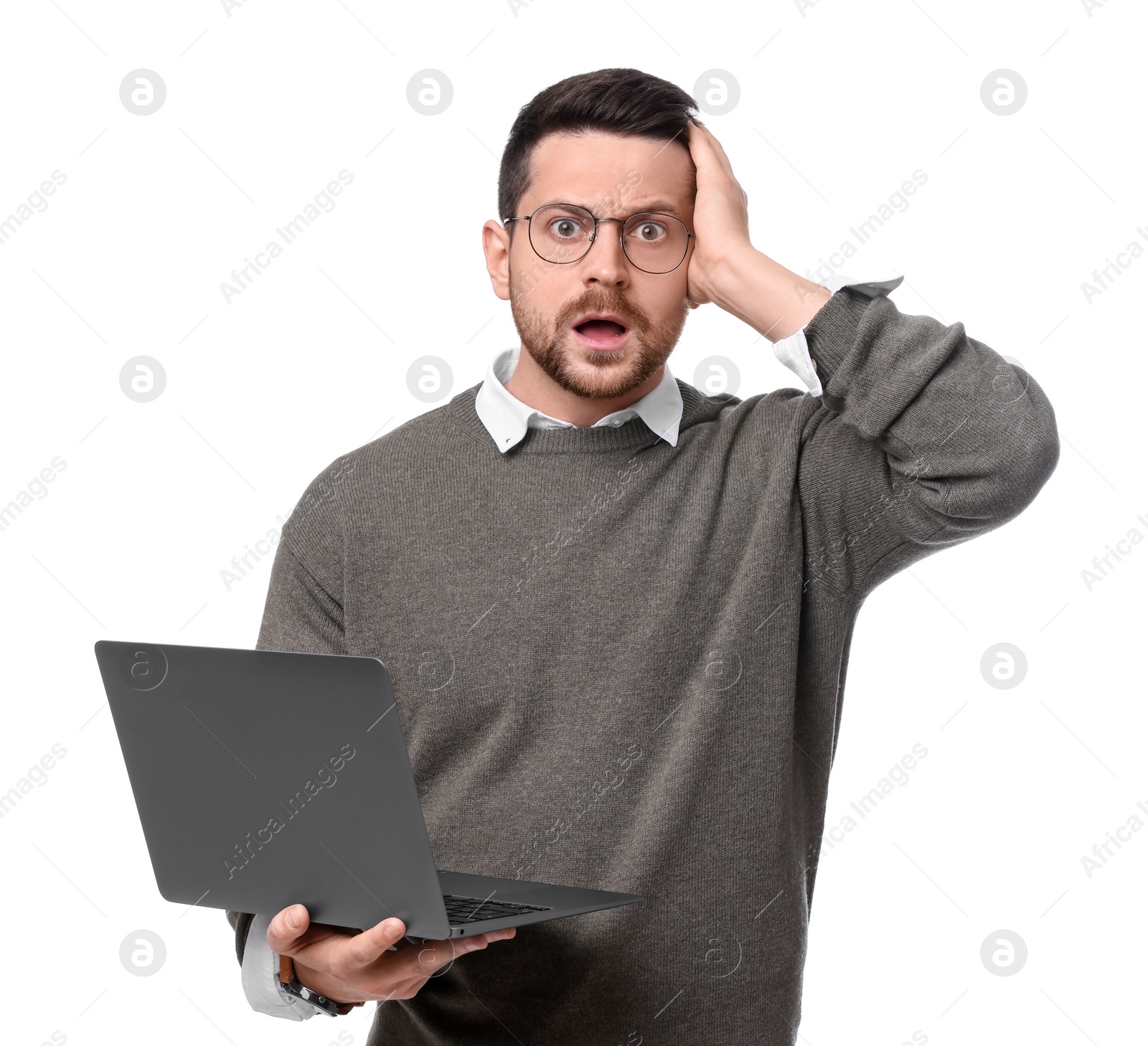 Photo of Handsome bearded businessman with laptop on white background