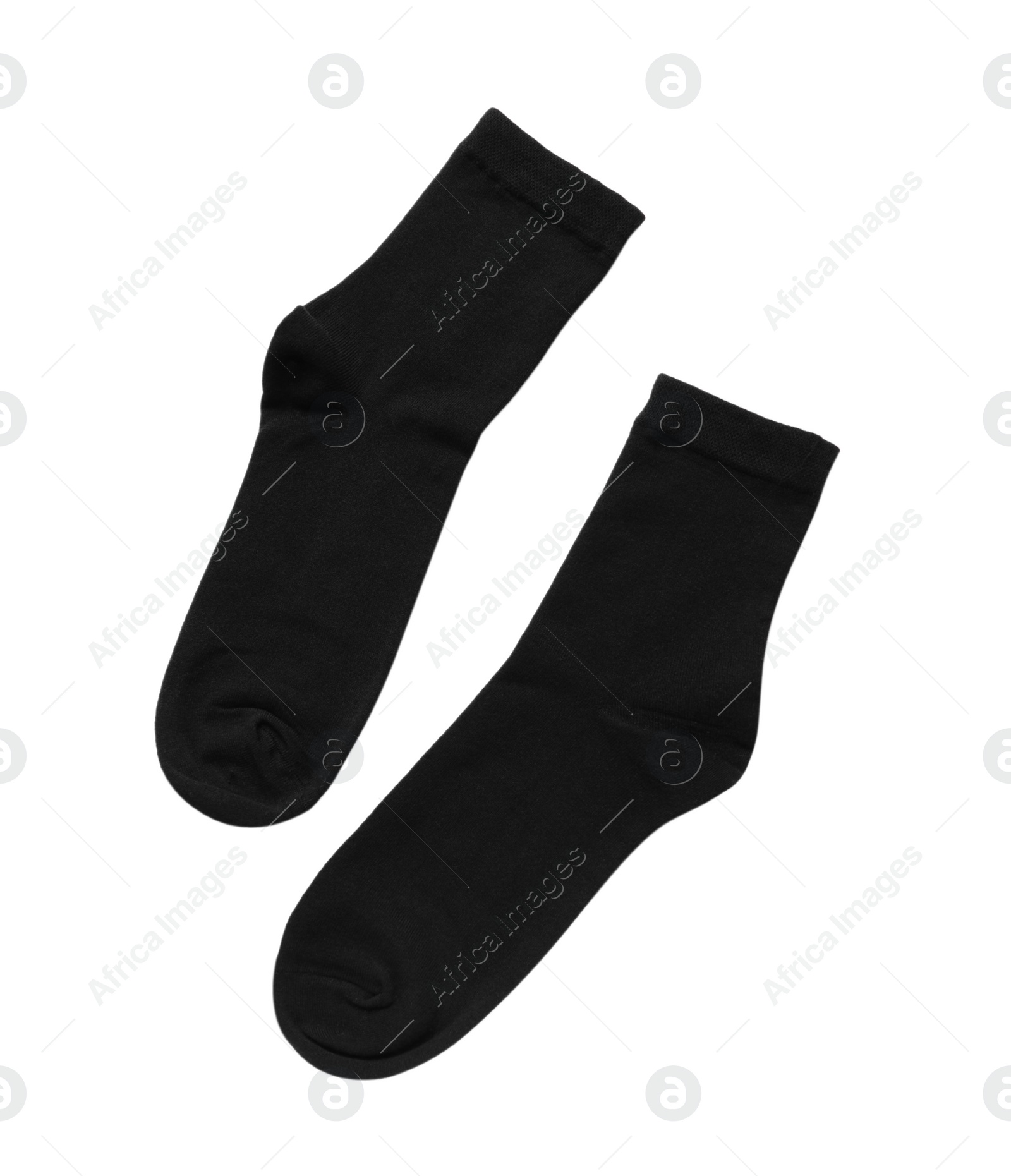 Photo of Pair of black socks isolated on white, top view