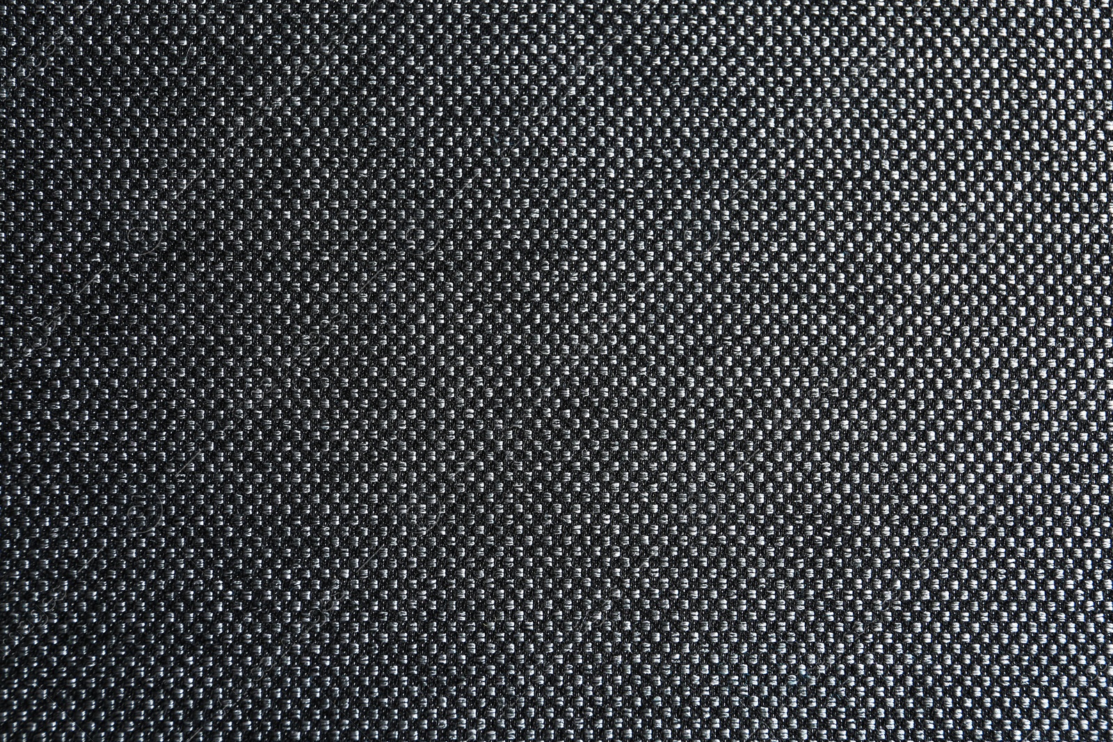 Photo of Texture of dark fabric as background, closeup