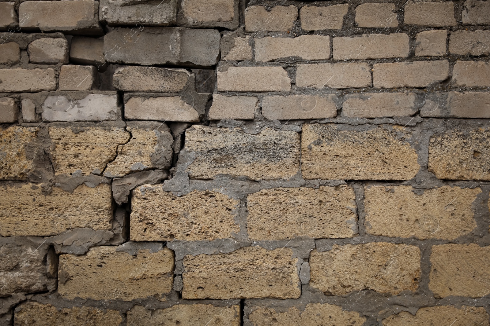 Photo of Large crack in brick wall after strong earthquake