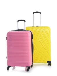 Modern suitcases for travelling on white background