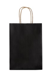 Blank black paper bag on white background. Space for design