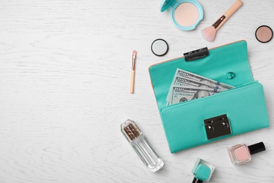 Photo of Flat lay composition with stylish wallet and accessories on light background