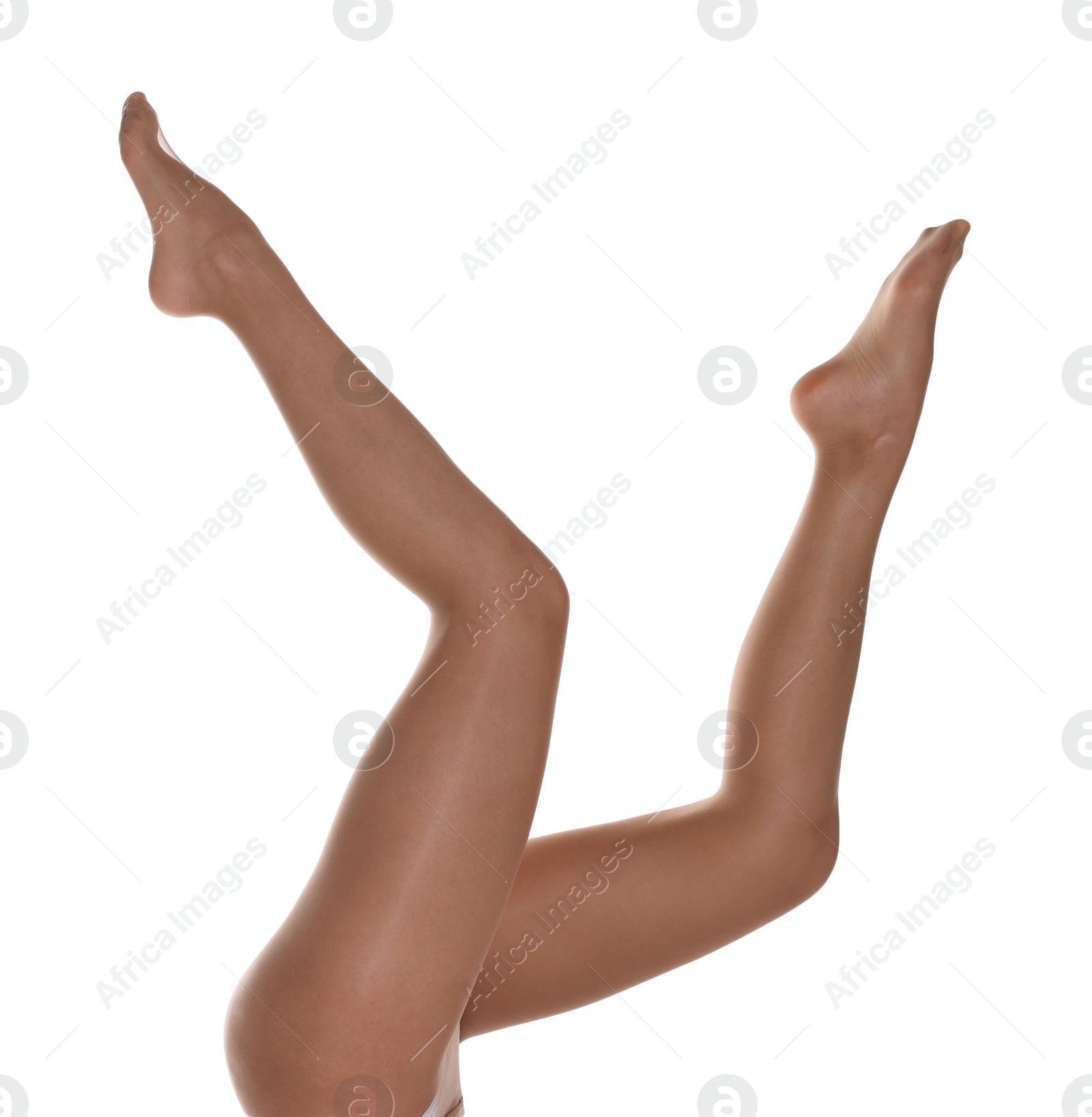 Photo of Woman with beautiful long legs wearing tights on white background, closeup