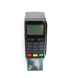 Photo of Modern payment terminal with credit card on white background, top view. Space for text