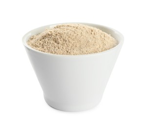 Photo of Bowl of buckwheat flour isolated on white