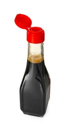 Photo of Tasty soy sauce in bottle isolated on white