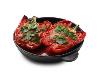 Photo of Tasty stuffed peppers in dish isolated on white