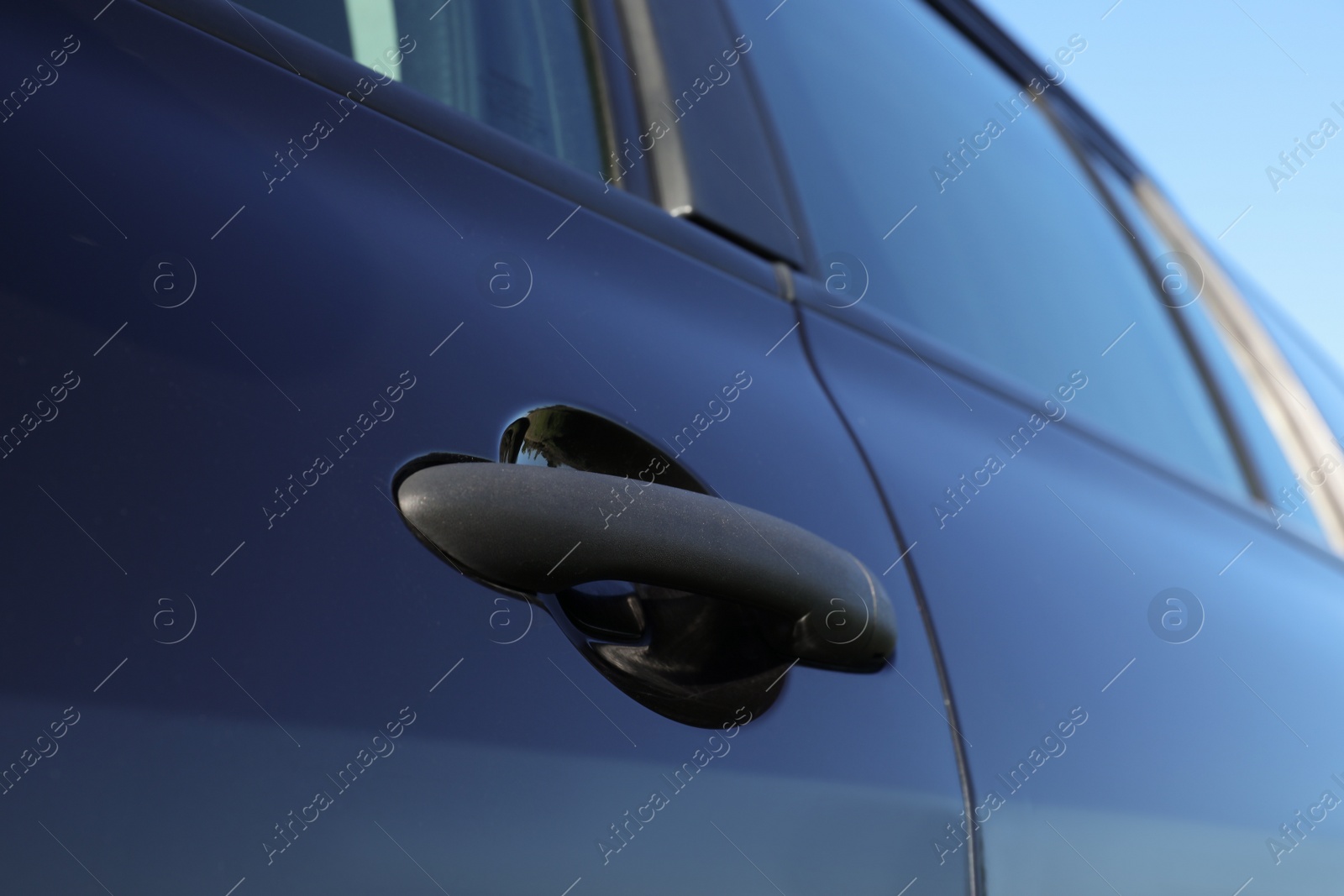 Photo of Car with door handle outdoors, closeup view