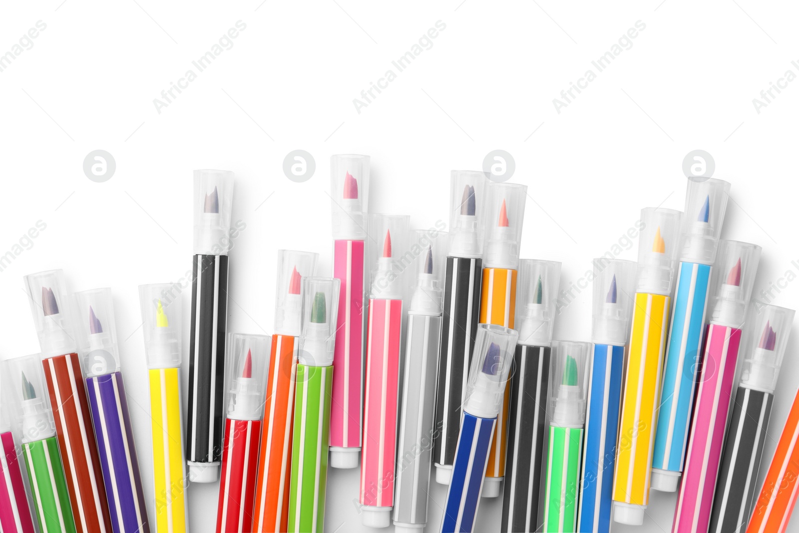 Photo of Many bright markers isolated on white, top view