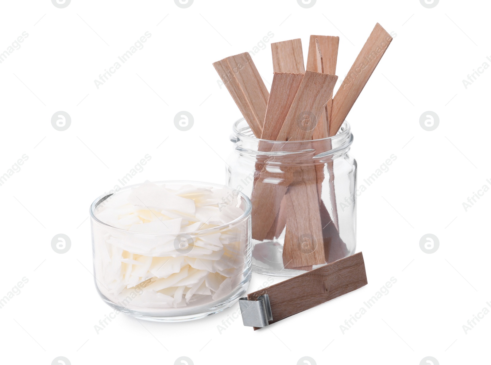 Photo of Wax flakes and wooden wicks on white background. Making homemade candle