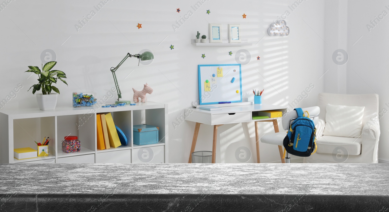 Image of Empty grey stone table in baby room interior