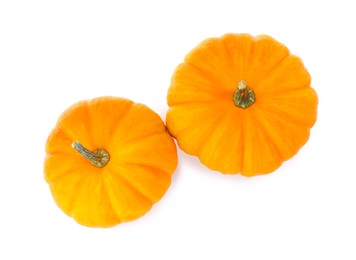 Photo of Fresh ripe pumpkins on white background, top view