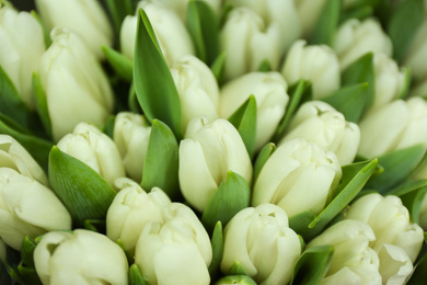 Photo of Beautiful bouquet of tulip flowers as background, closeup