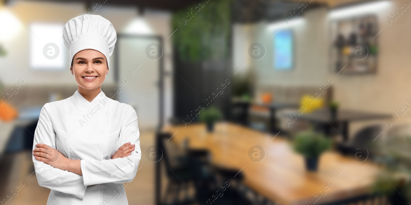 Image of Smiling chef in uniform at restaurant, space for text. Banner design