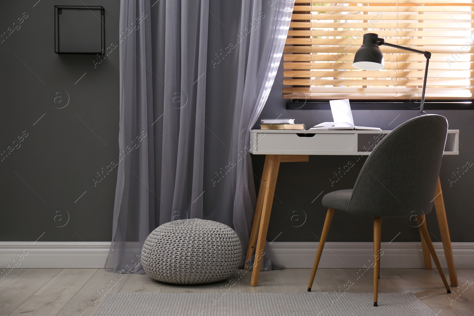 Photo of Beautiful curtains on window in stylish office interior