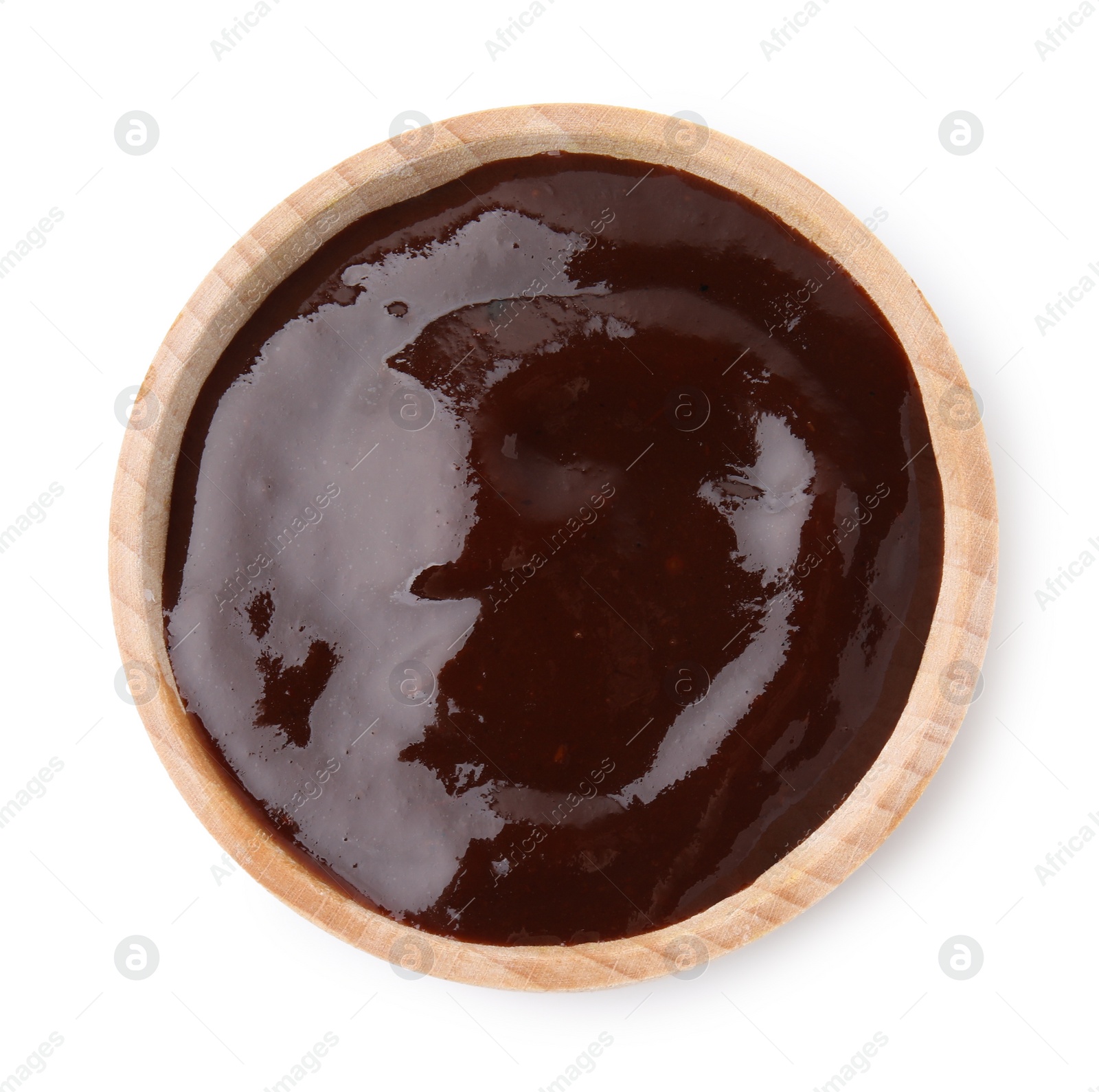 Photo of Fresh marinade in wooden bowl isolated on white, top view