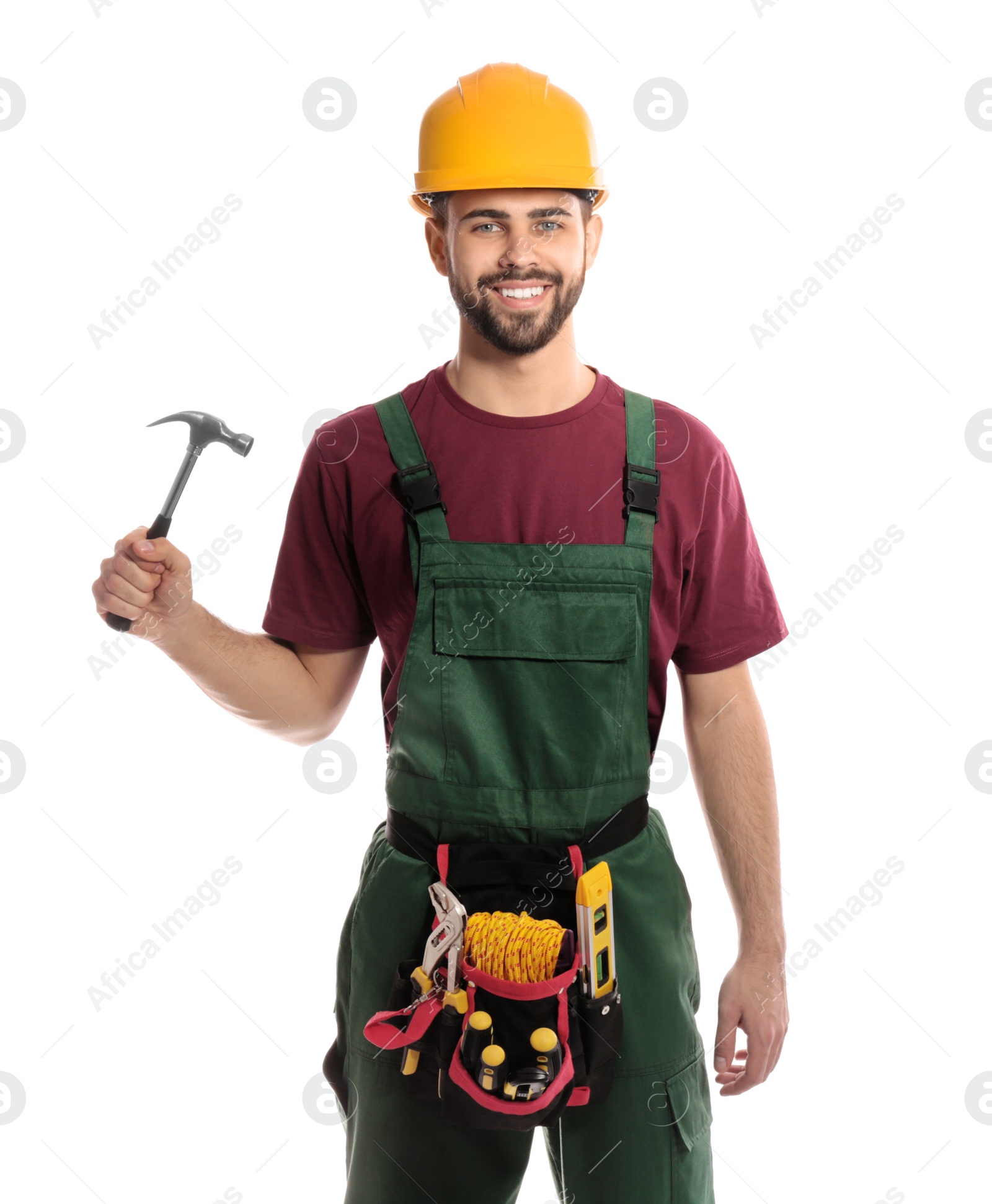 Photo of Portrait of professional construction worker with hammer and tool belt on white background