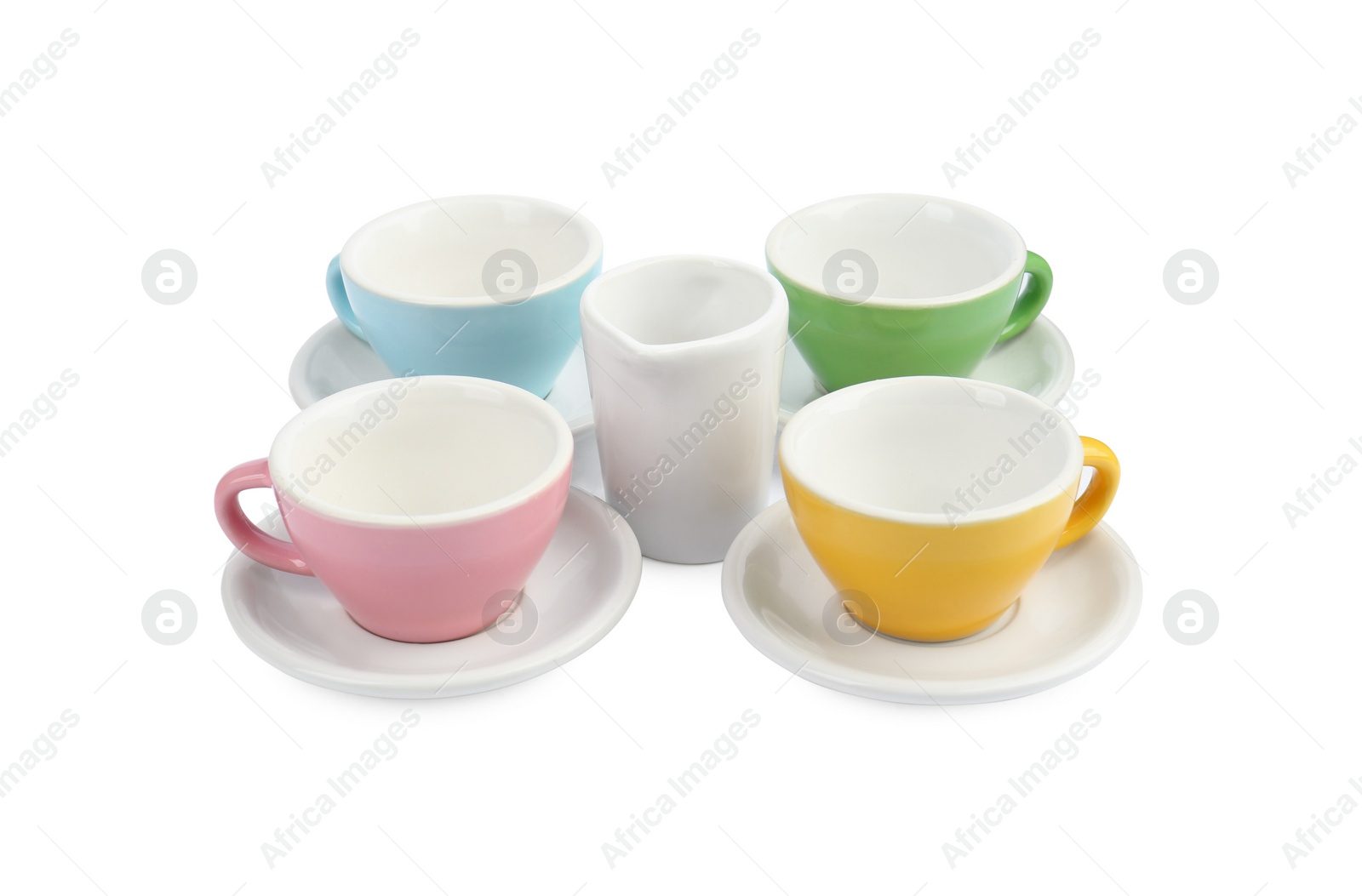 Photo of Set of cups isolated on white. Children's toys