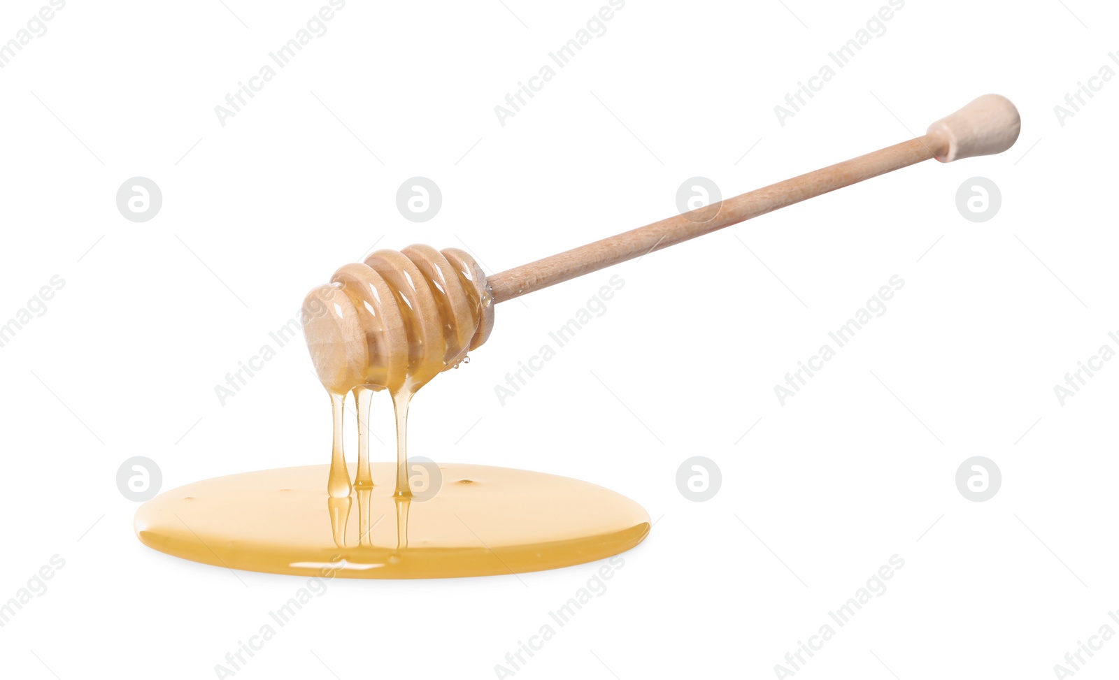 Photo of Natural honey dripping from dipper on white background