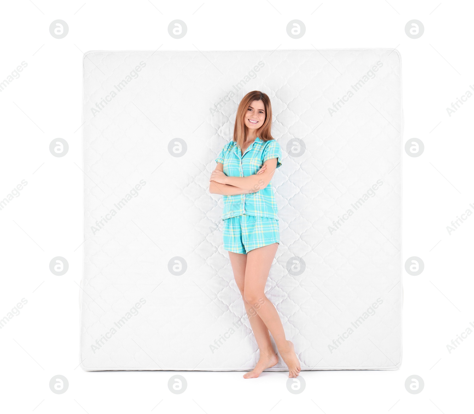 Photo of Woman with comfortable mattress isolated on white