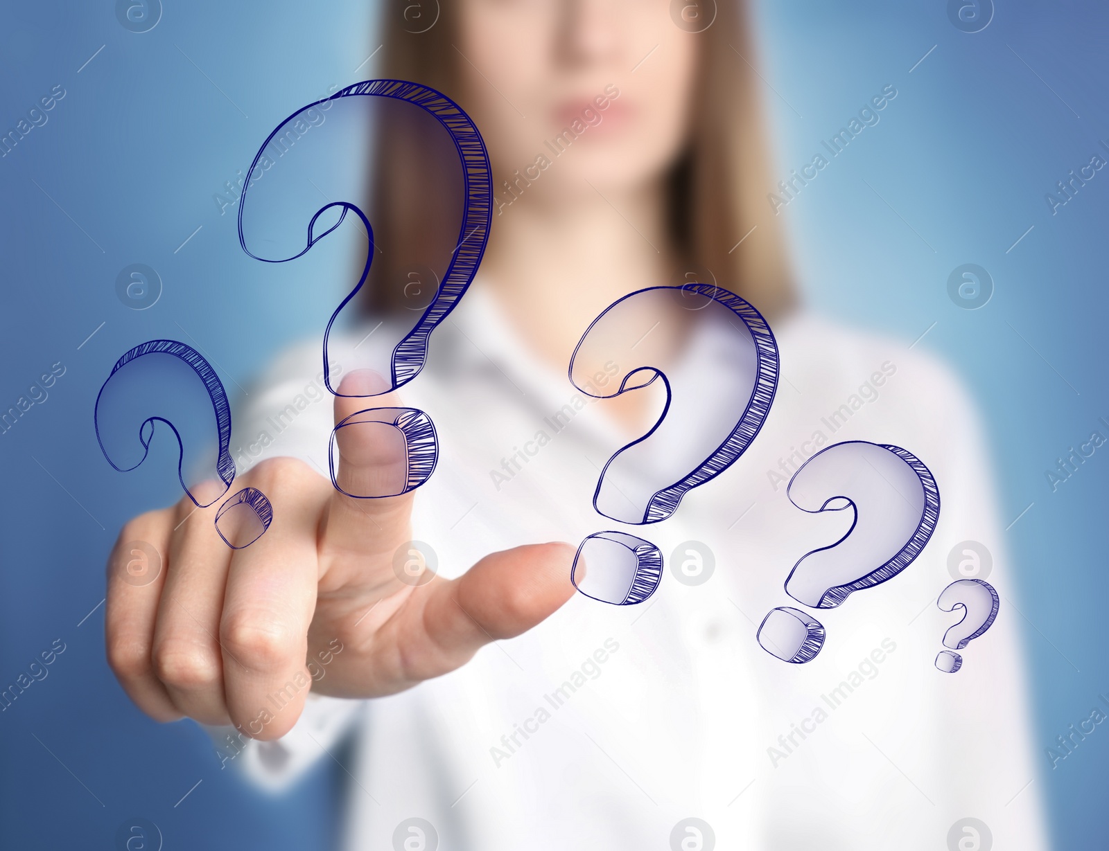 Image of Businesswoman on blue background touching drawing of question mark