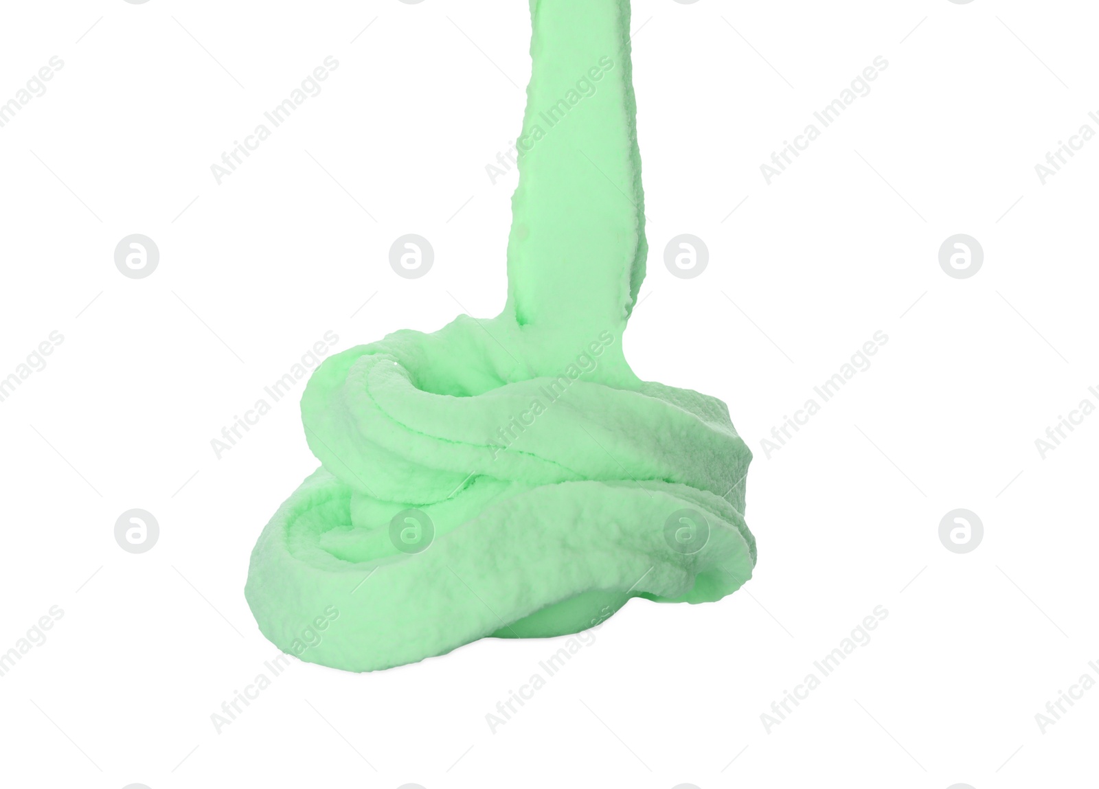 Photo of Flowing green slime on white background. Antistress toy