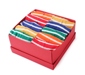 Box with cute child socks on white background