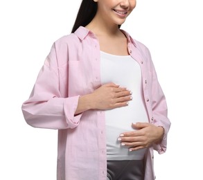 Photo of Pregnant woman touching her belly on white background, closeup