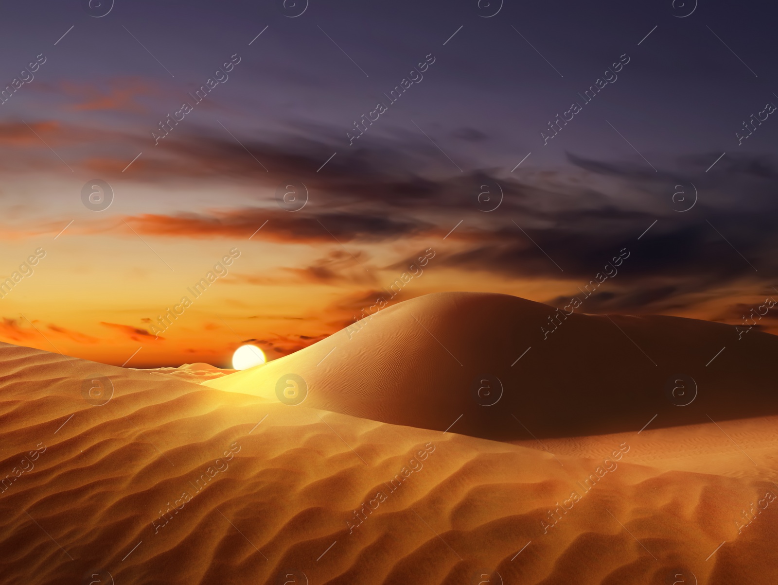 Image of Beautiful view of sandy desert at sunset